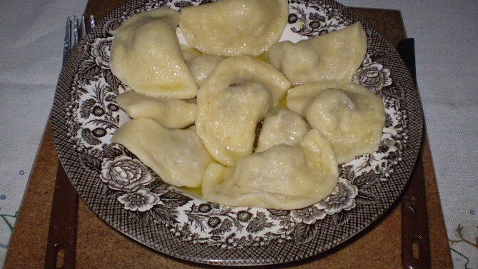 Cooked pelmeni on plate