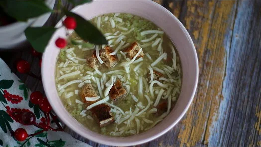 Vegetarian soup with croutons and cheese