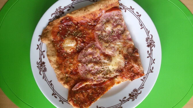 Pizza slice on plate