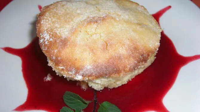 Baked dessert with berry sauce