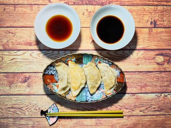 Gyoza dumplings with dipping sauces