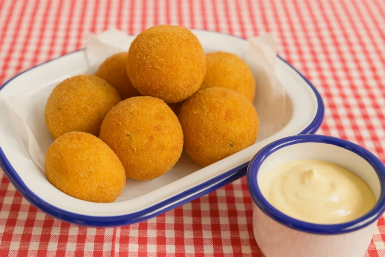 Fried potato croquettes with sauce