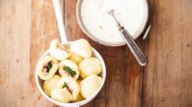Stuffed potato dumplings with dip