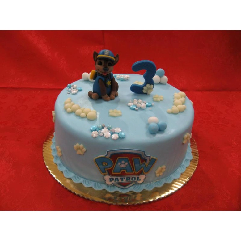 Modrý dort s postavou Chase z Paw Patrol pro třetí narozeniny chlapce.