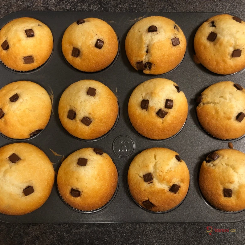 Baked chocolate chip muffins in tray