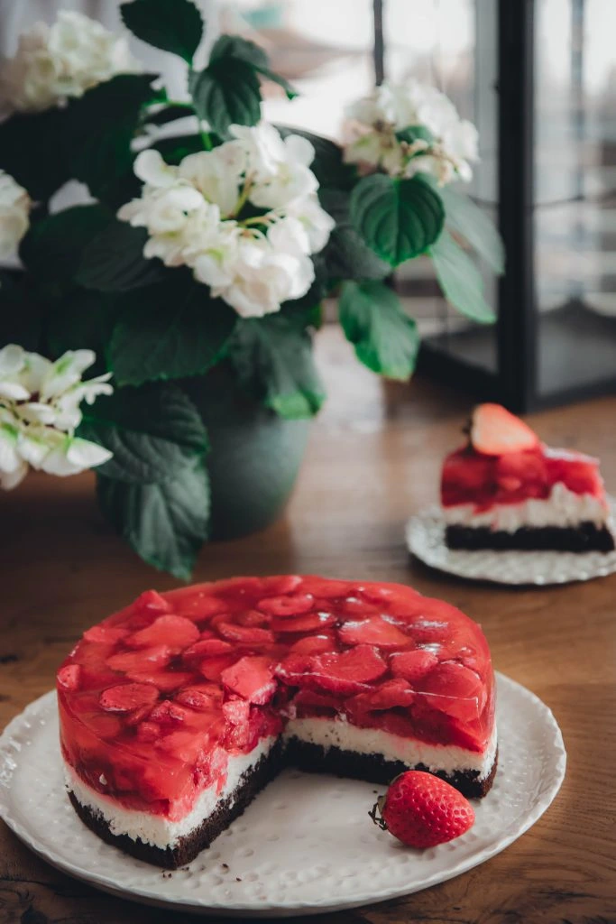 Strawberry jelly cake with slice removed
