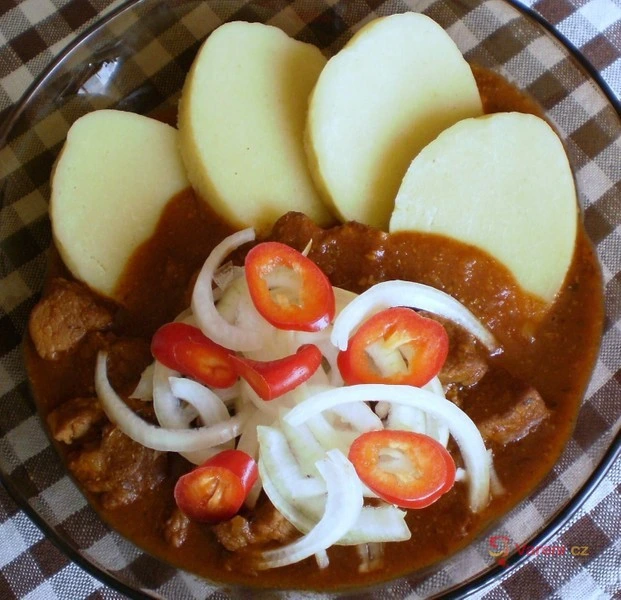 Pork shoulder stew with potatoes and peppers