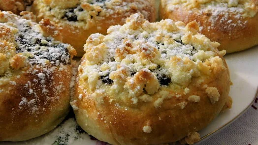 Crumb-topped buns on tray