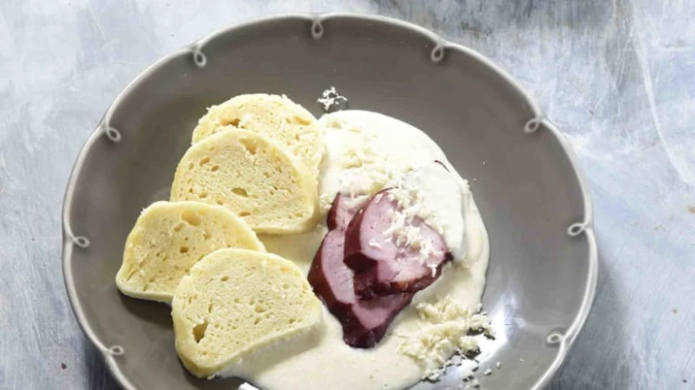 Czech dumplings with ham and sauce