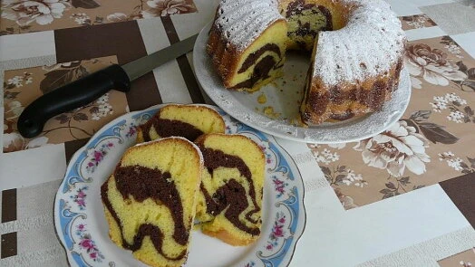 Marbled bundt cake slices and whole cake